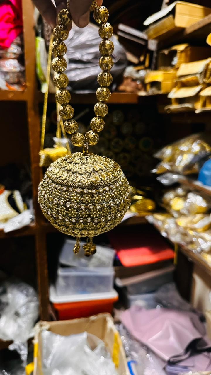 latest metal potli clutch